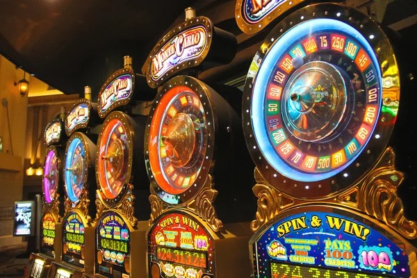 Live casino table with dealer and players